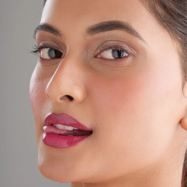 Close-up of a woman's face wearing Phool Key shade