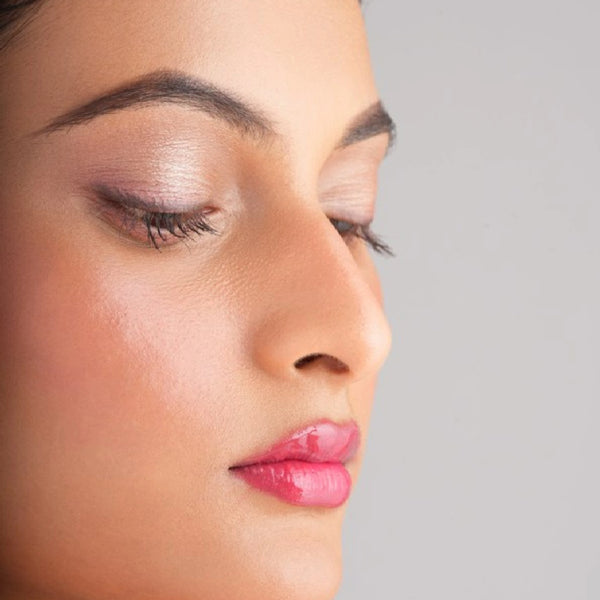 Phool Key lip gloss natural pink shade on lips