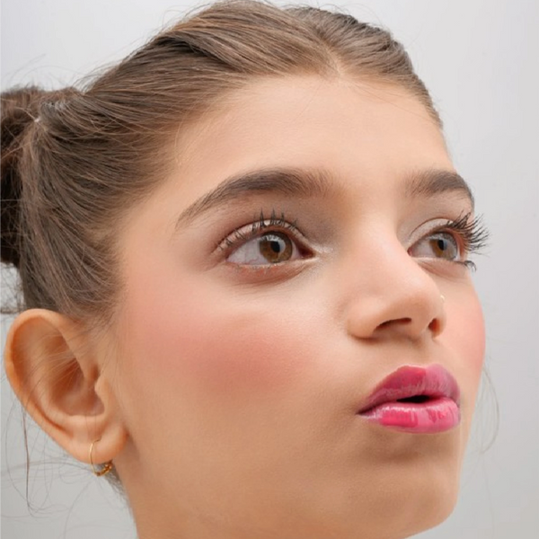 Close-up of model wearing Nakhrewali glossy lips and ckeek tint