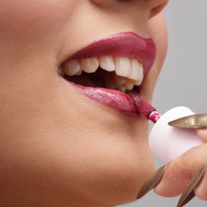 Tamasha with applicator wand close-up